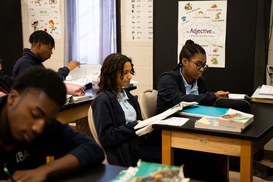 Students working at lab tables in a classroom